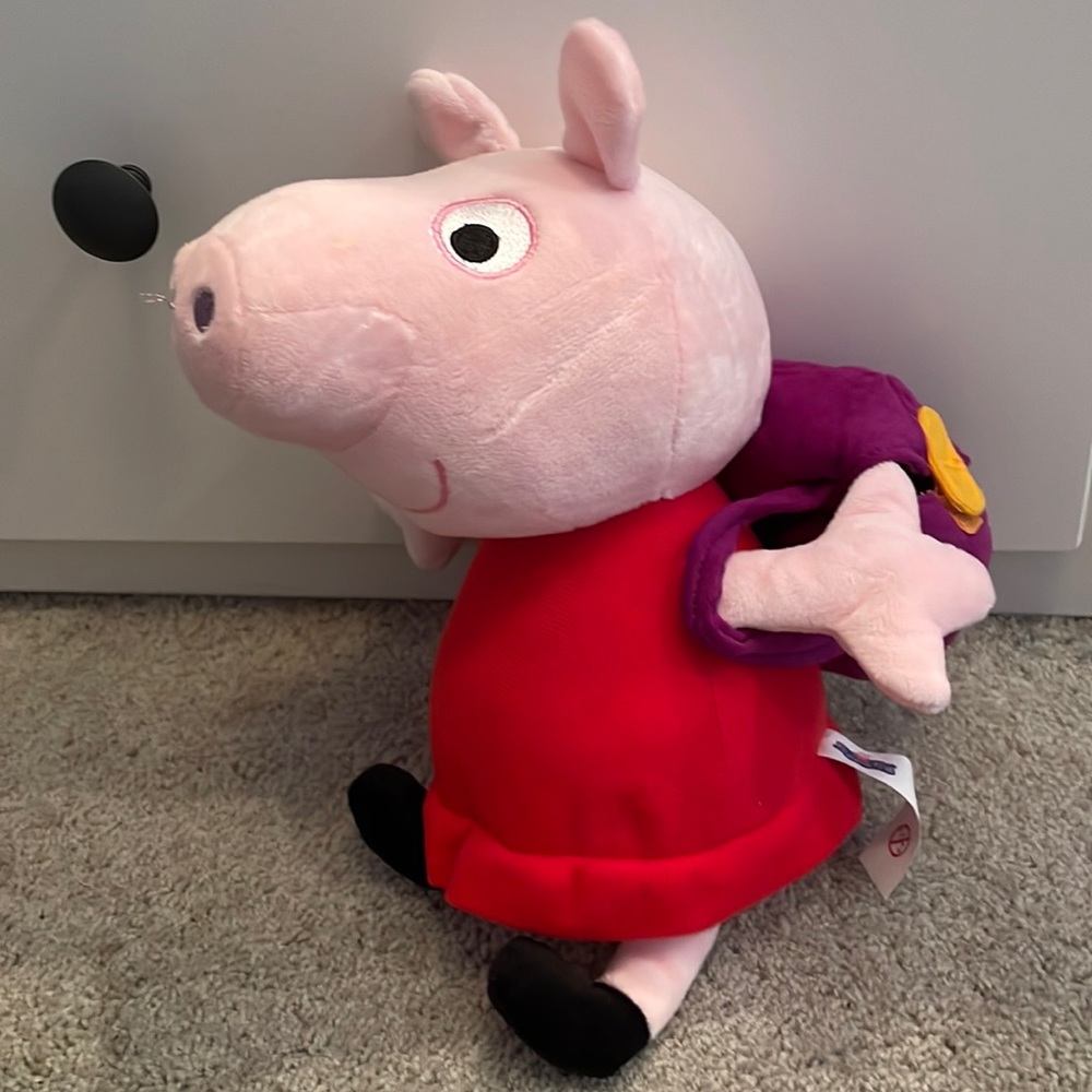 Peppa Pig stuffed doll with backpack